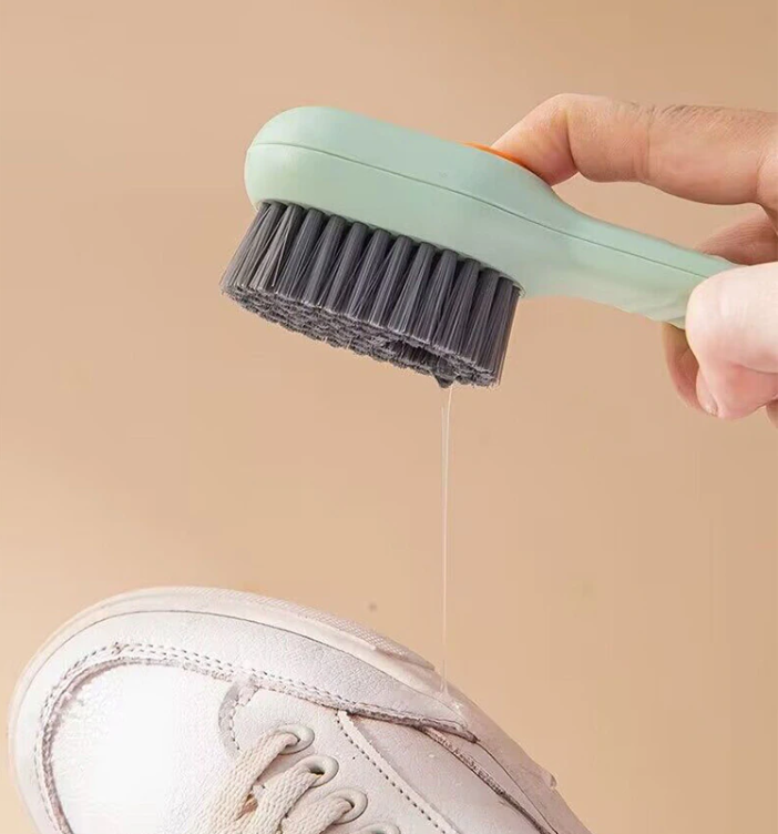 Automatic Liquid Discharge Shoe Brush in use